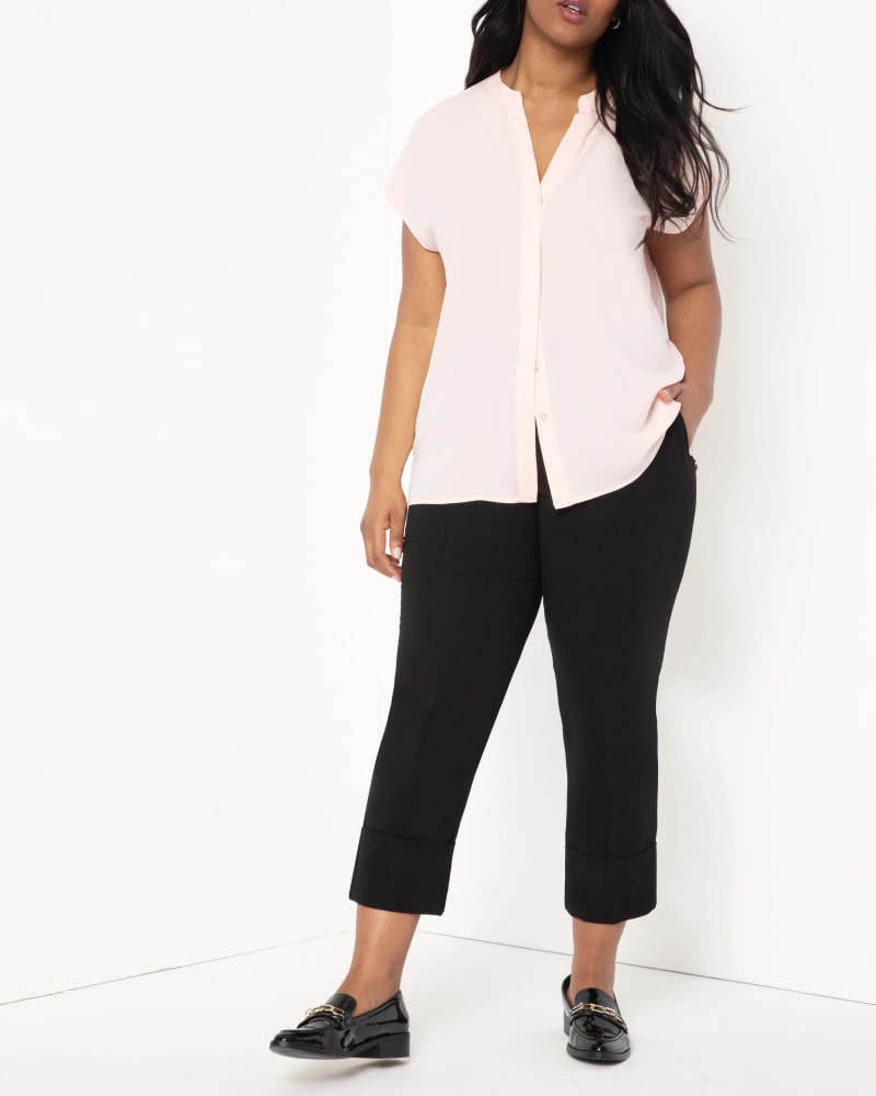 Front of a model wearing a size 14 Nola Notch Collar Blouse in Cloud Pink by ELOQUII. | dia_product_style_image_id:196112